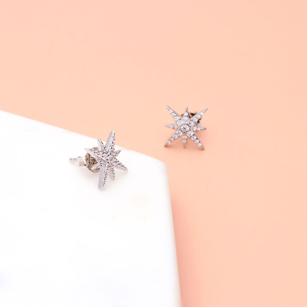 Flatlay view of North Star CZ Stud Earrings in Sterling Silver