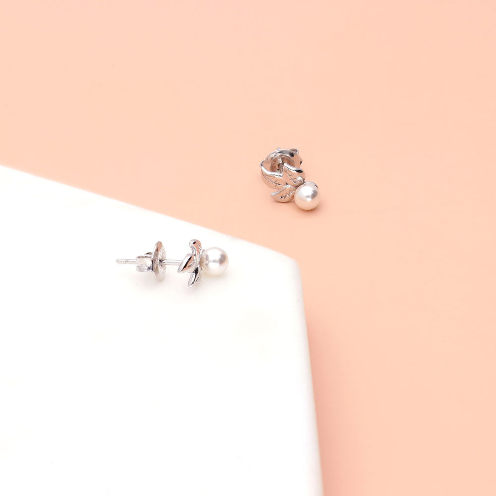 Flatlay view of Leaf Imitation Pearl Stud Earrings in Sterling Silver, Rhodium Plated
