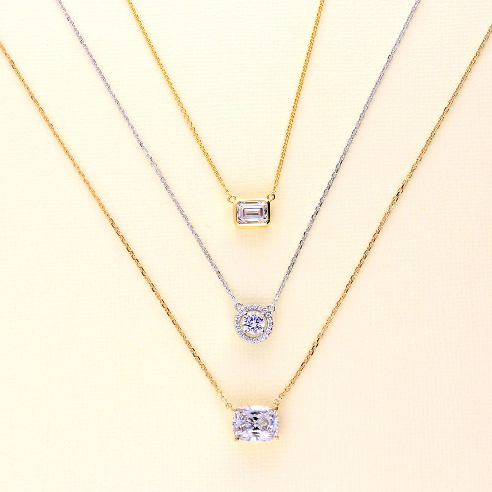 Flatlay view of Solitaire 1ct Bezel Set Emerald Cut CZ Necklace in Sterling Silver