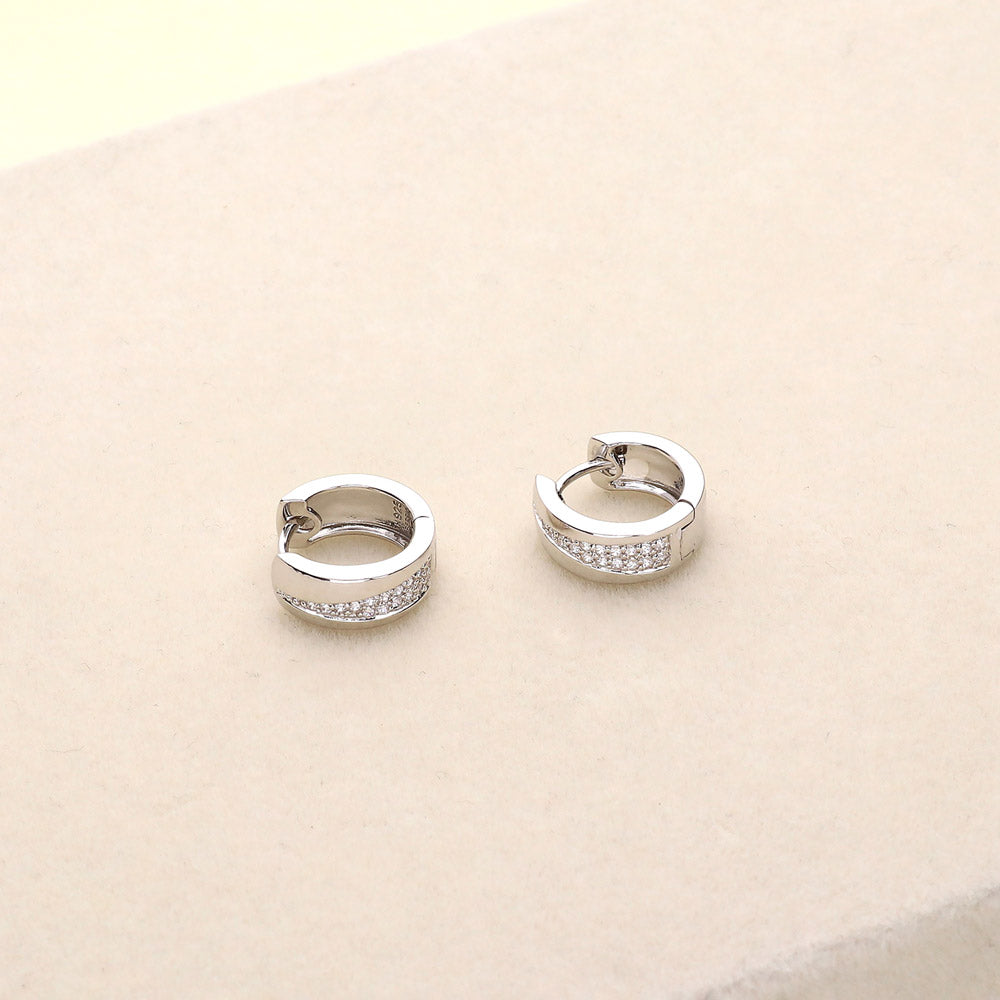 Flatlay view of CZ Small Huggie Earrings in Sterling Silver 0.55 inch, 6 of 7