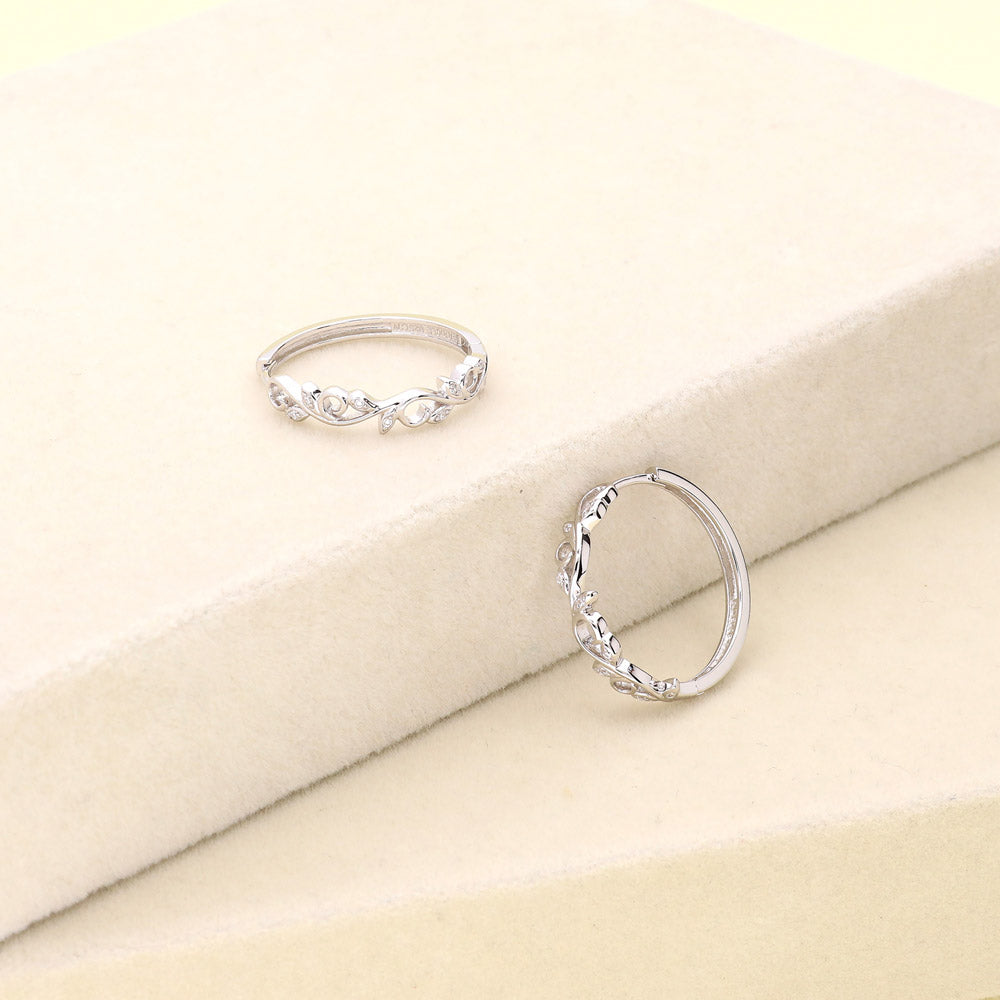 Flatlay view of Leaf Filigree CZ Medium Hoop Earrings in Sterling Silver 0.98 inch