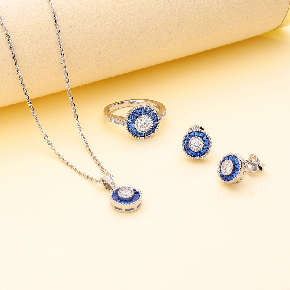 Flatlay view of Halo Art Deco Round CZ Necklace and Earrings Set in Sterling Silver