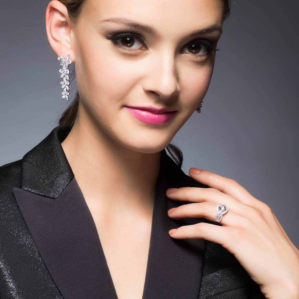 Model wearing 3-Stone Round CZ Ring in Sterling Silver