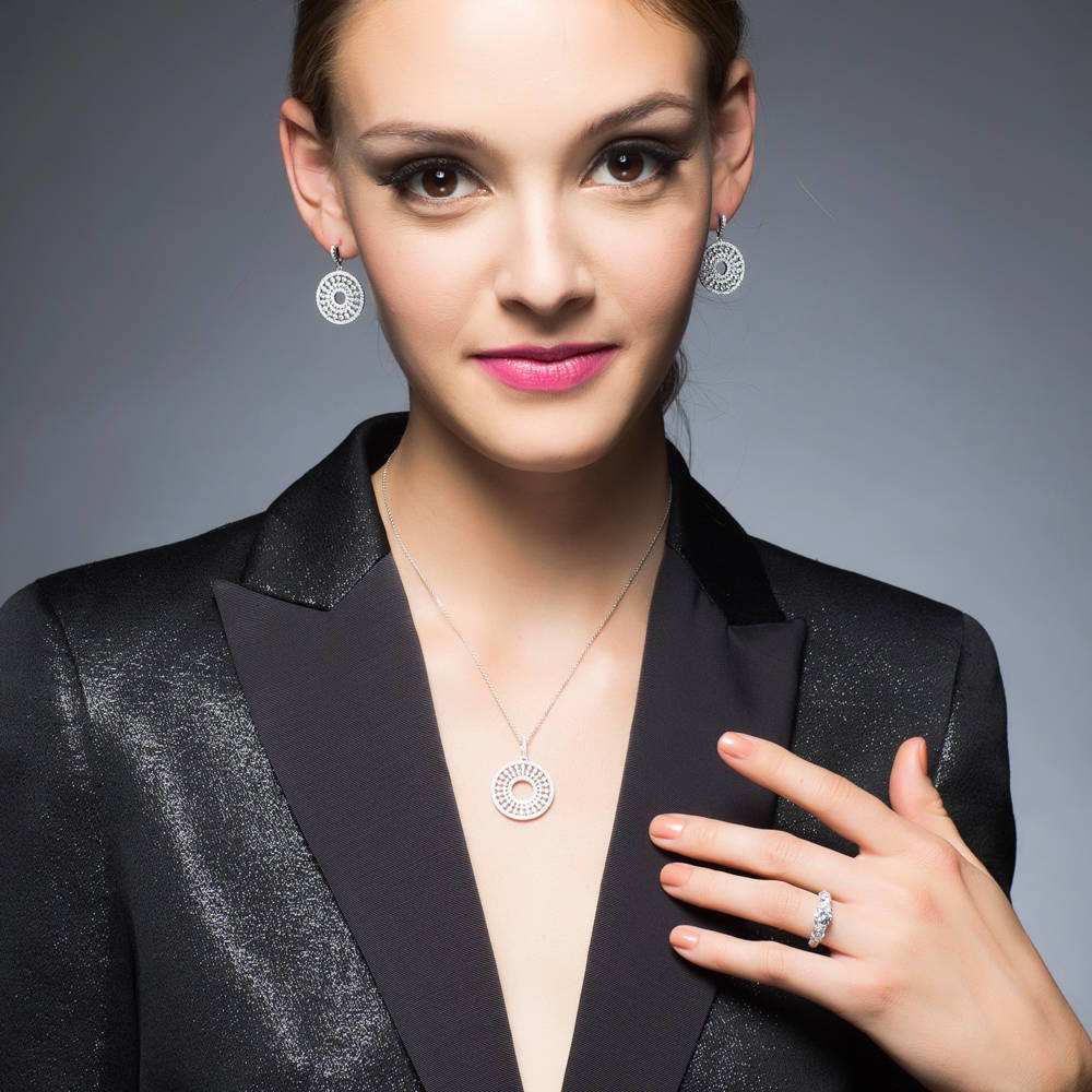 Model wearing 3-Stone Art Deco Round CZ Ring in Sterling Silver