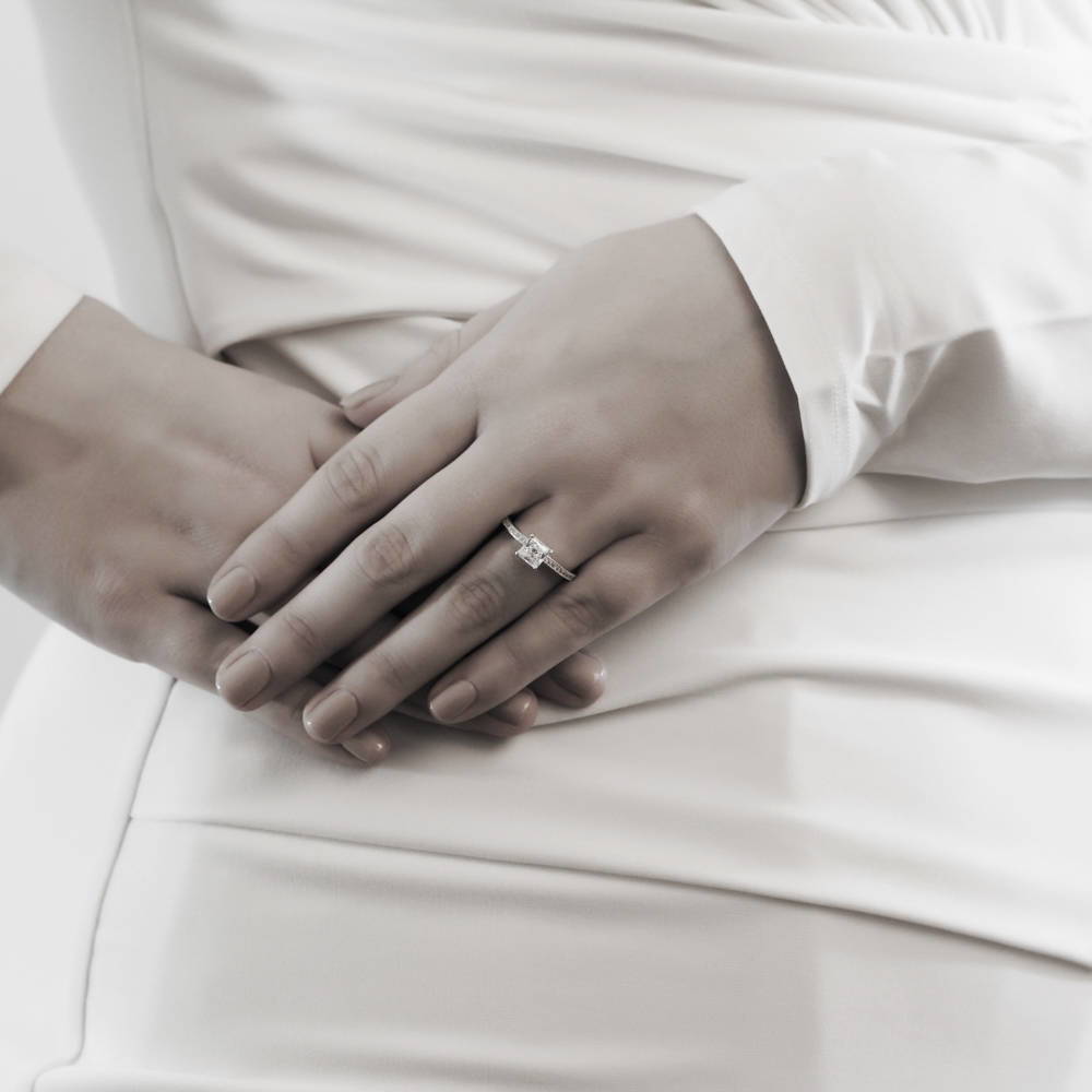 Model wearing Solitaire 1ct Princess CZ Ring in Sterling Silver, 2 of 7