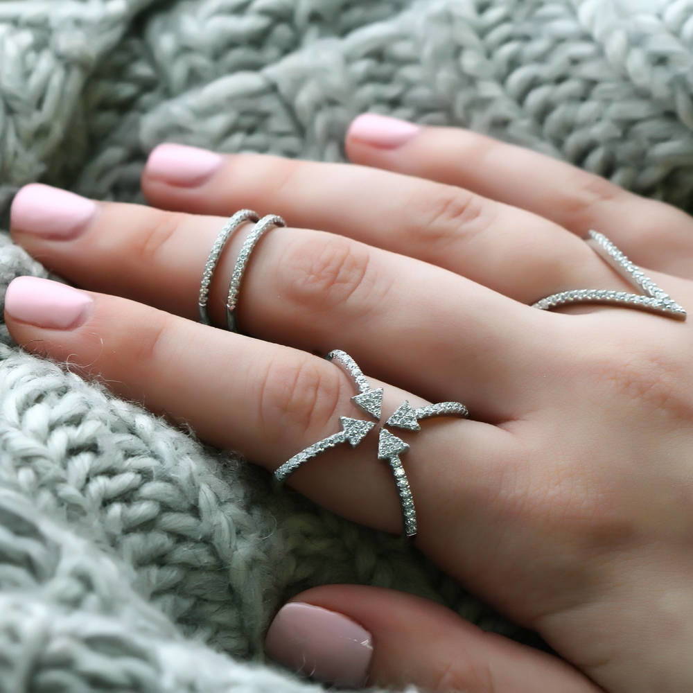 Image Contain: Model Wearing Arrow Ring, Criss Cross Ring, Half Eternity Ring