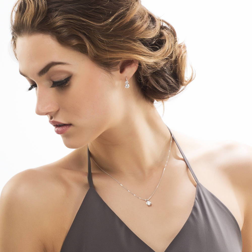 Model wearing CZ Leverback Dangle Earrings in Sterling Silver