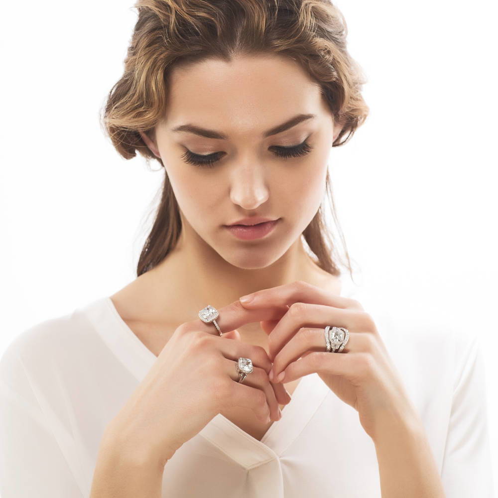 Model wearing Pave Set CZ Curved Half Eternity Ring in Sterling Silver