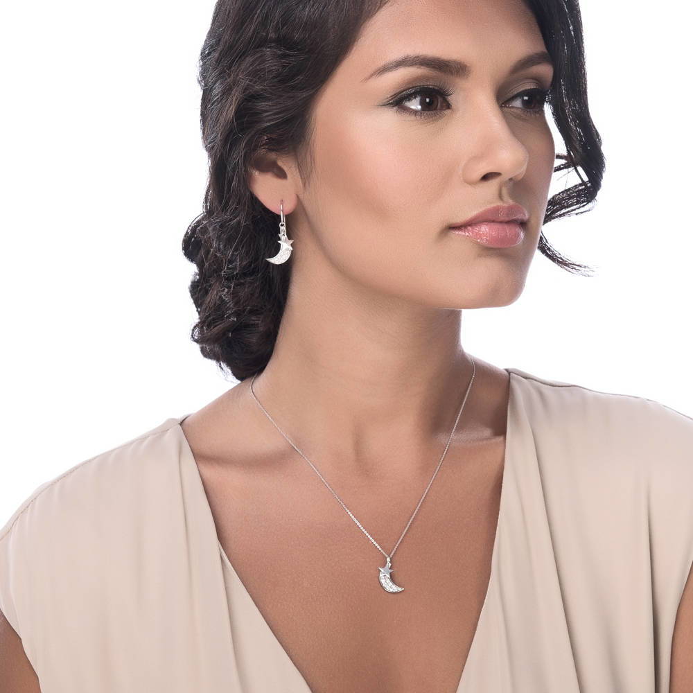 Model wearing Star Crescent Moon CZ Pendant Necklace in Sterling Silver