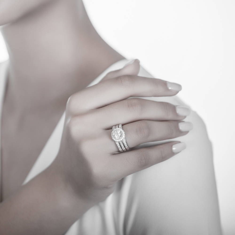 Model wearing Halo Round CZ Statement Ring Set in Sterling Silver