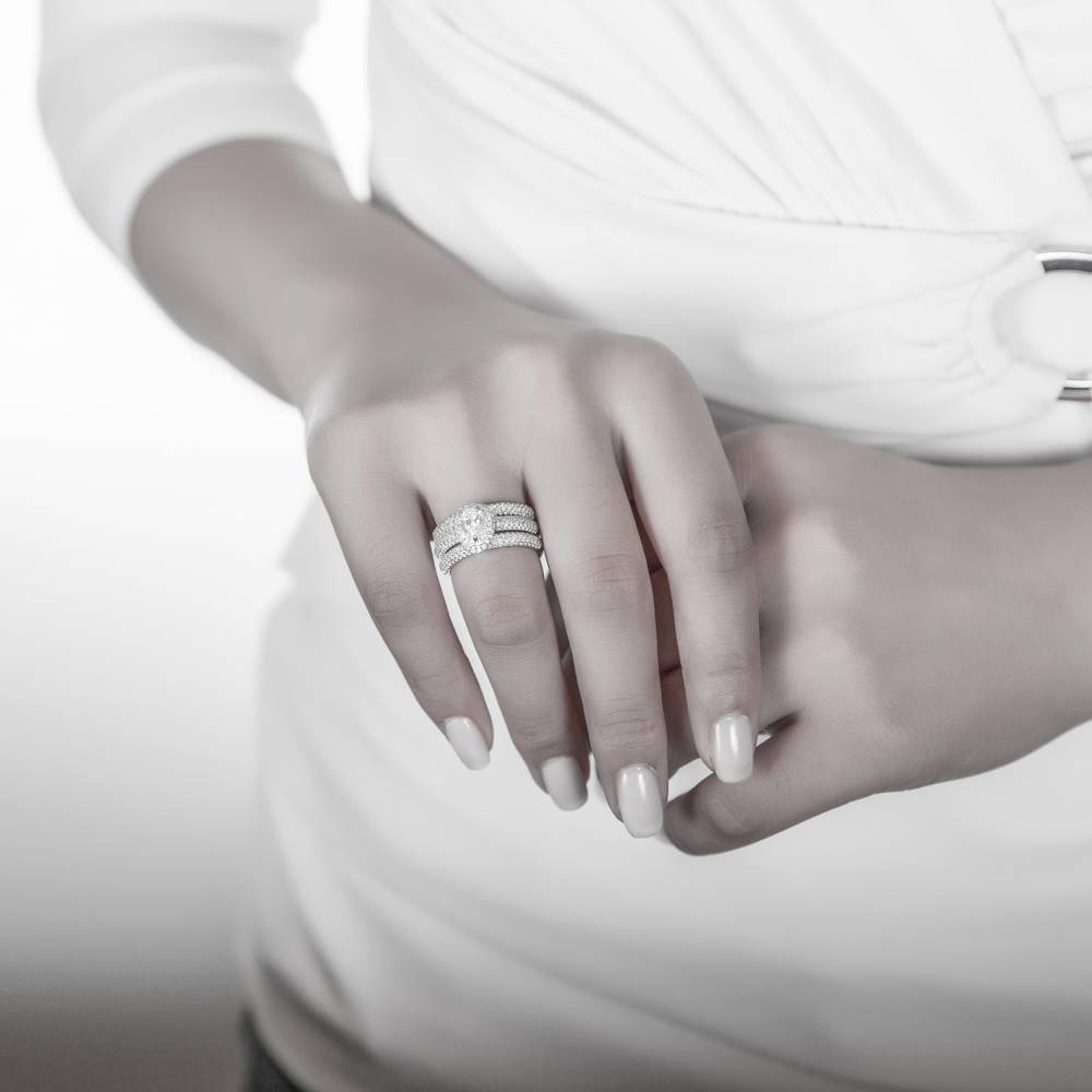 Model wearing Halo Pear CZ Statement Ring Set in Sterling Silver