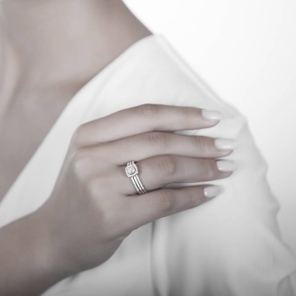 Model wearing Halo Cushion CZ Ring Set in Sterling Silver