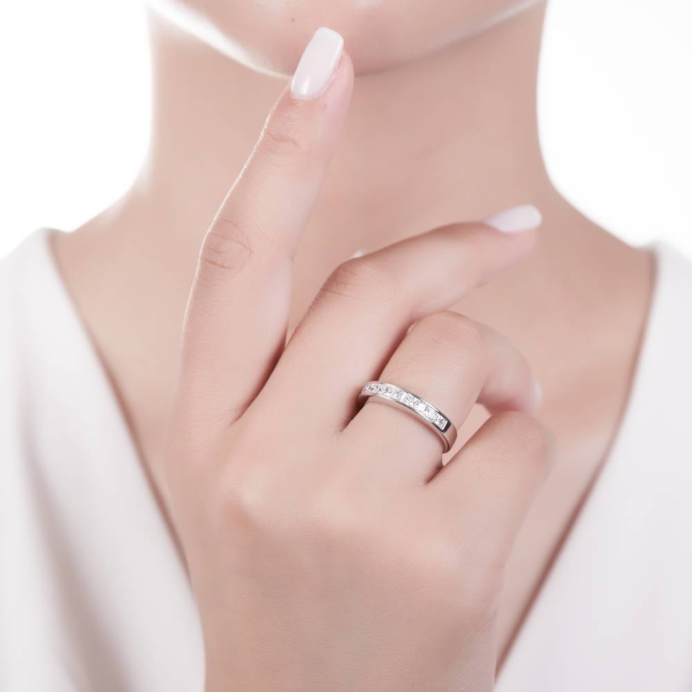 Model wearing Channel Set Princess CZ Half Eternity Ring in Sterling Silver