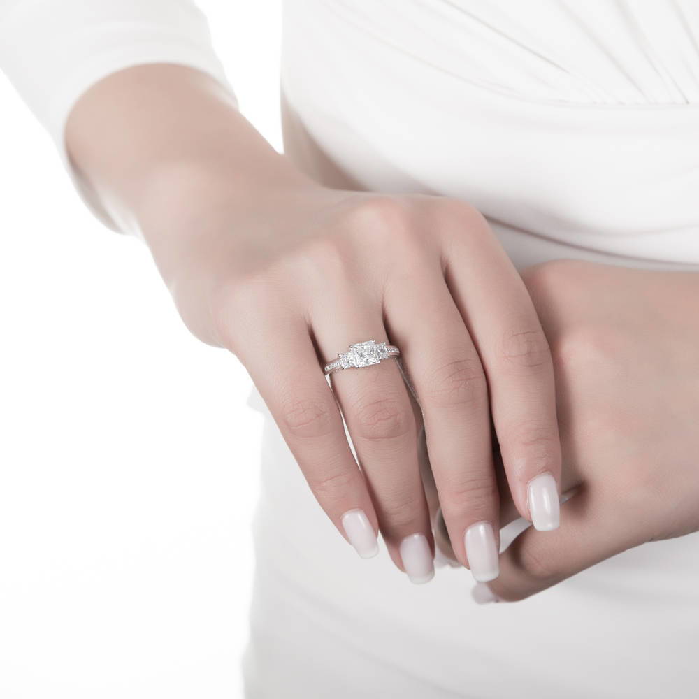 Model wearing 3-Stone Princess CZ Ring in Sterling Silver