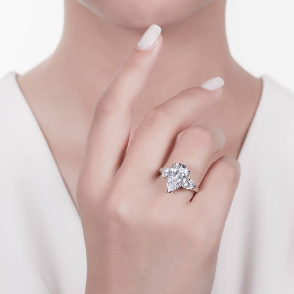 Model wearing 3-Stone Pear CZ Statement Ring in Sterling Silver