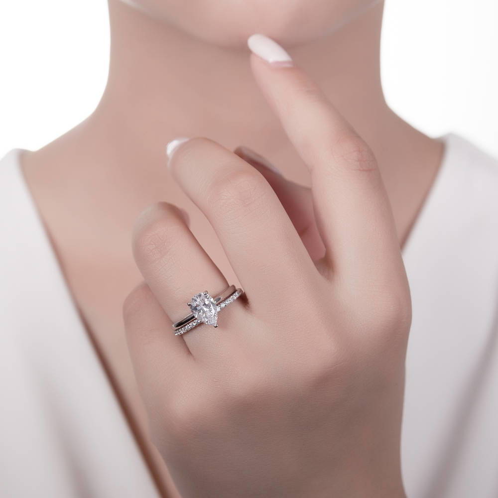 Model wearing Solitaire 1.8ct Pear CZ Ring Set in Sterling Silver