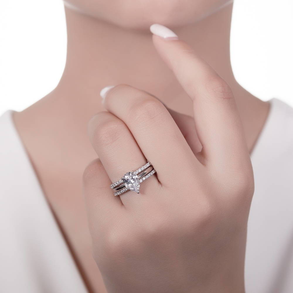 Model wearing Solitaire 1.8ct Pear CZ Ring Set in Sterling Silver