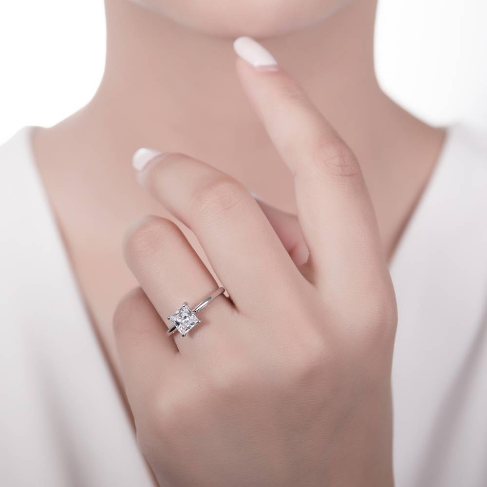 Model wearing Solitaire 1.6ct Princess CZ Ring Set in Sterling Silver