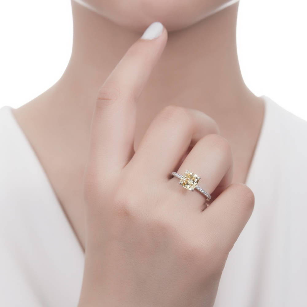 Model wearing Solitaire 3ct Canary Yellow Cushion CZ Ring Set in Sterling Silver