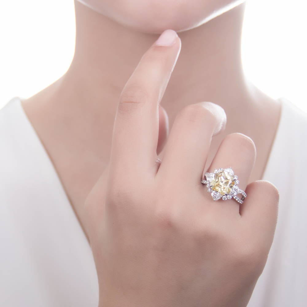 Model wearing Halo Flower Canary Cushion CZ Split Shank Ring in Sterling Silver