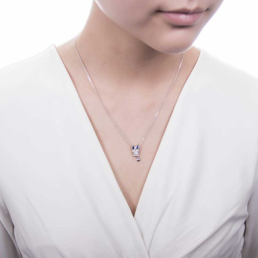 Model wearing Owl CZ Pendant Necklace in Sterling Silver