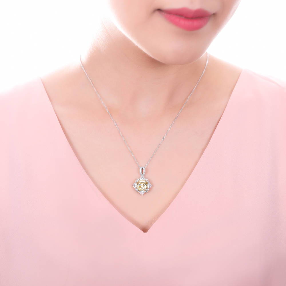 Model wearing Halo Flower Canary Cushion CZ Necklace in Sterling Silver