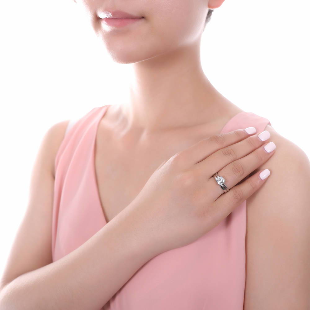 Model wearing Solitaire 2ct Asscher CZ Ring Set in Sterling Silver