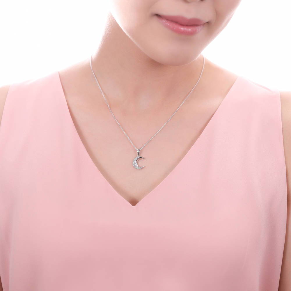 Model wearing Crescent Moon CZ Pendant Necklace in Sterling Silver