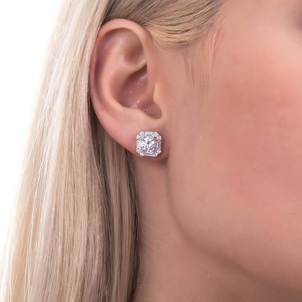 Model wearing Halo Art Deco Round CZ Stud Earrings in Sterling Silver