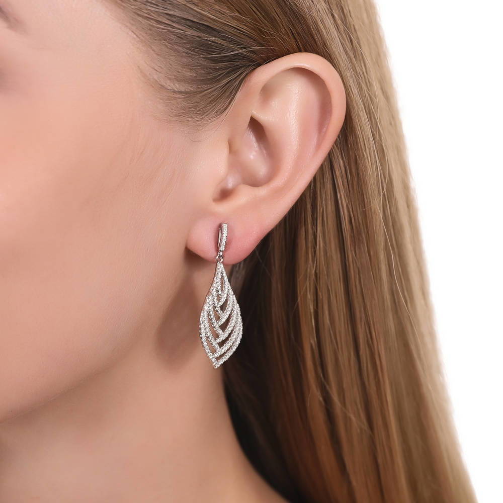 Model wearing Leaf CZ Dangle Earrings in Sterling Silver