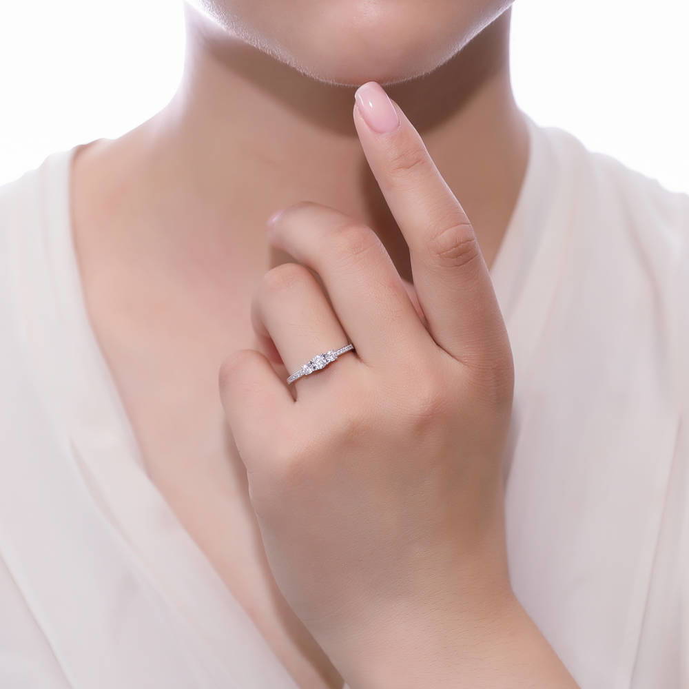 Model wearing 3-Stone Round CZ Ring in Sterling Silver, 3 of 7