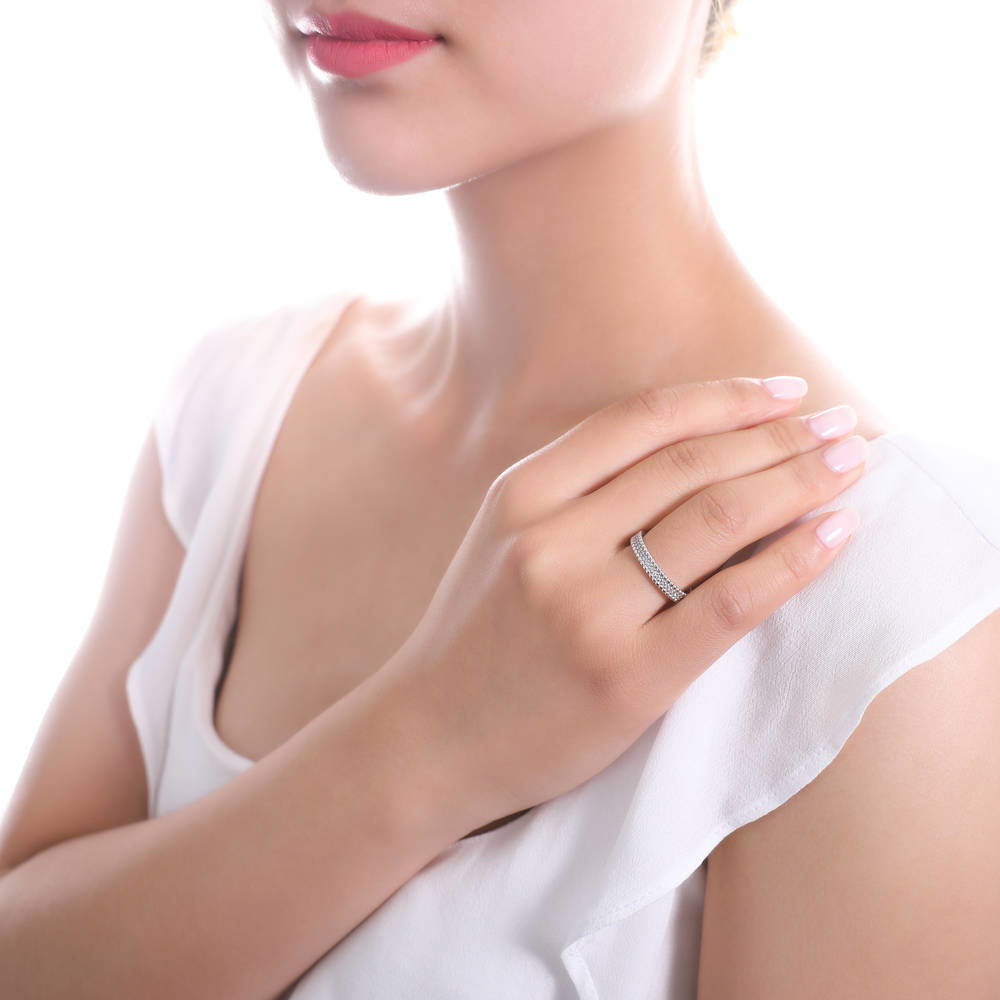 Model wearing Bead Pave Set CZ Eternity Ring in Sterling Silver