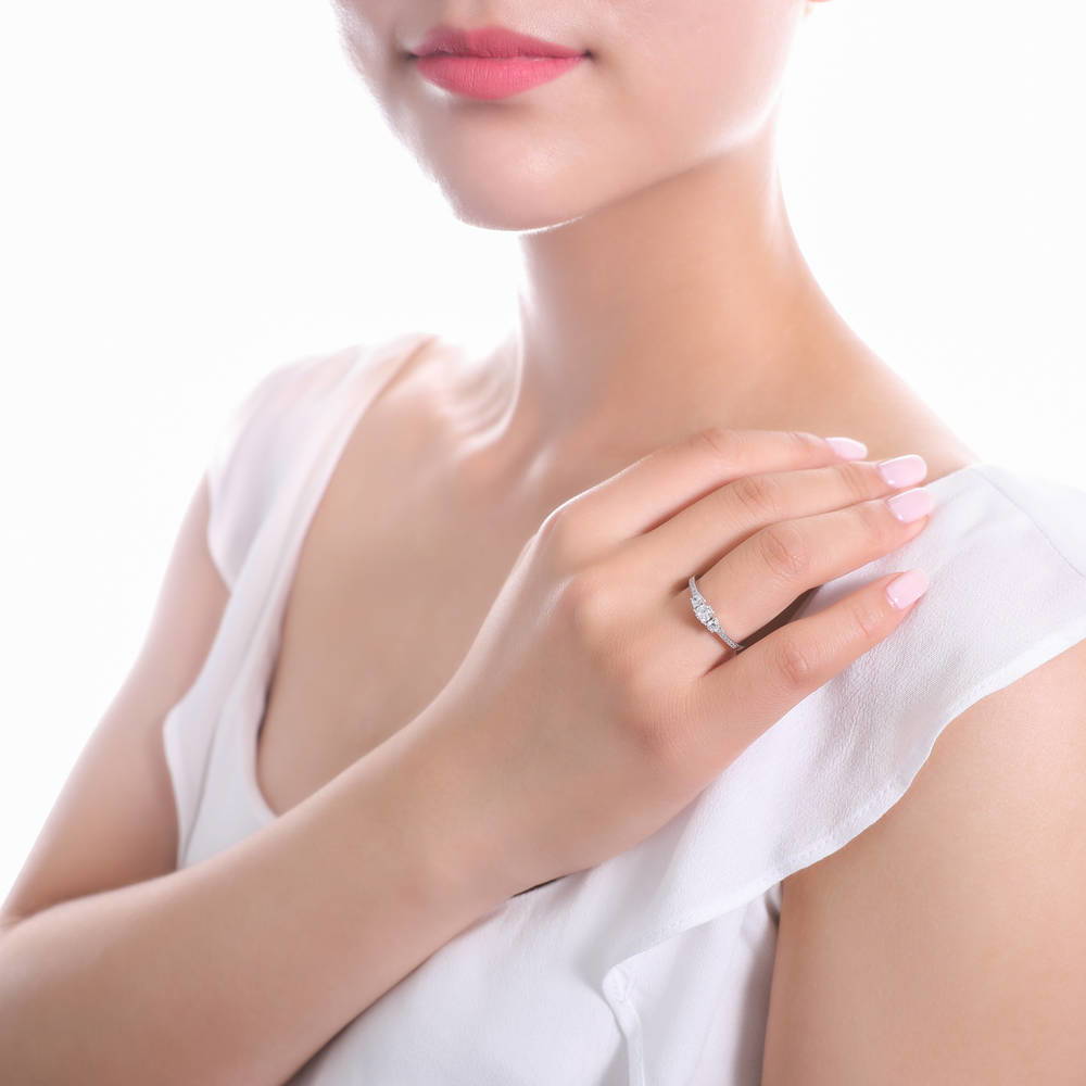 Model wearing 3-Stone Round CZ Ring in Sterling Silver