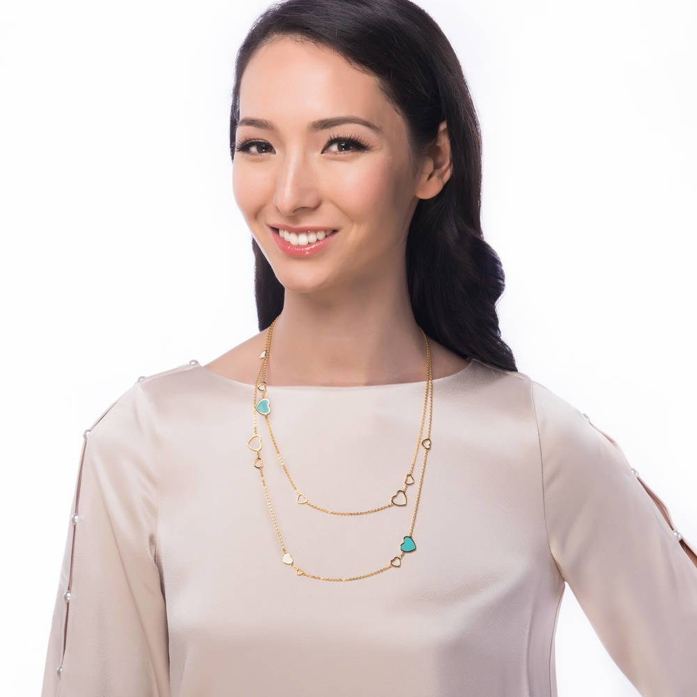 Model wearing Open Heart Enamel CZ Layered Necklace in Gold Flashed Sterling Silver, 2 of 4
