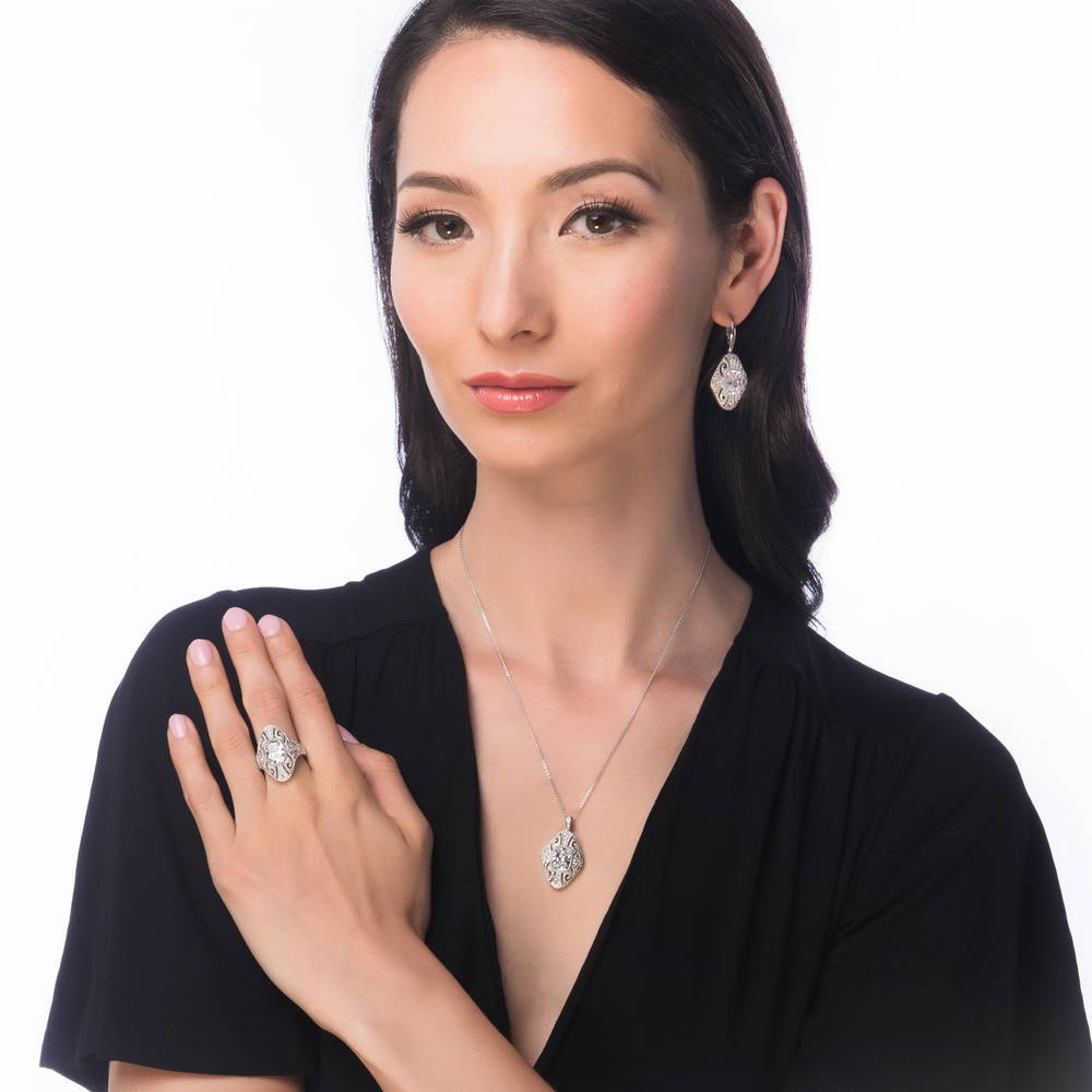 Model wearing Art Deco Filigree CZ Pendant Necklace in Sterling Silver