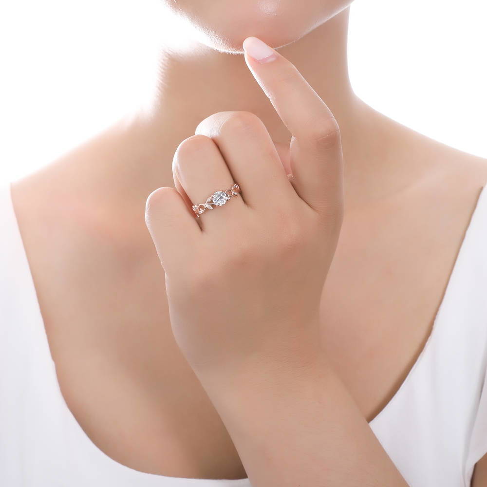 Model wearing Solitaire Leaf 0.8ct Round CZ Ring in Rose Gold Plated Sterling Silver