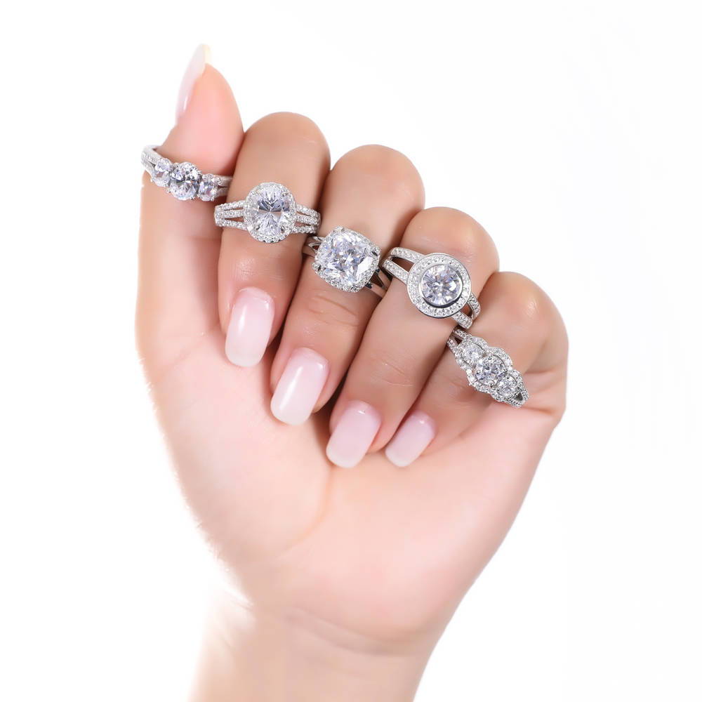 Model wearing 3-Stone Round CZ Split Shank Ring in Sterling Silver