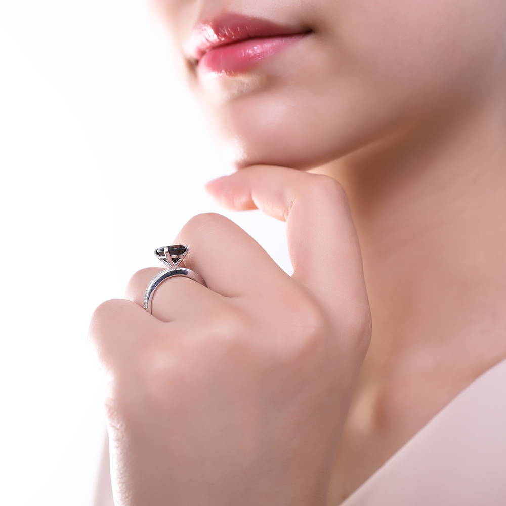 Model wearing Solitaire 3ct Black Cushion CZ Ring in Sterling Silver