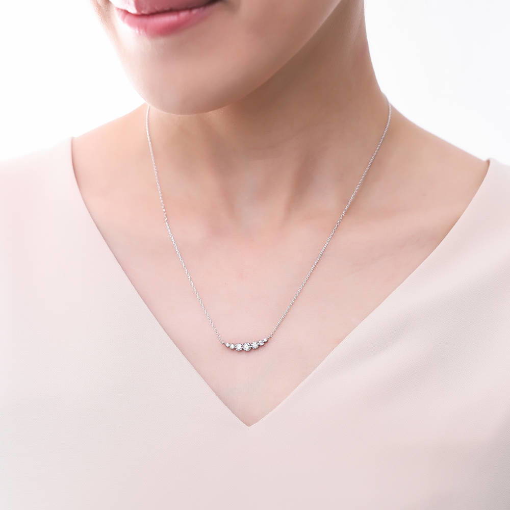 Model wearing Graduated Bubble CZ Pendant Necklace in Sterling Silver