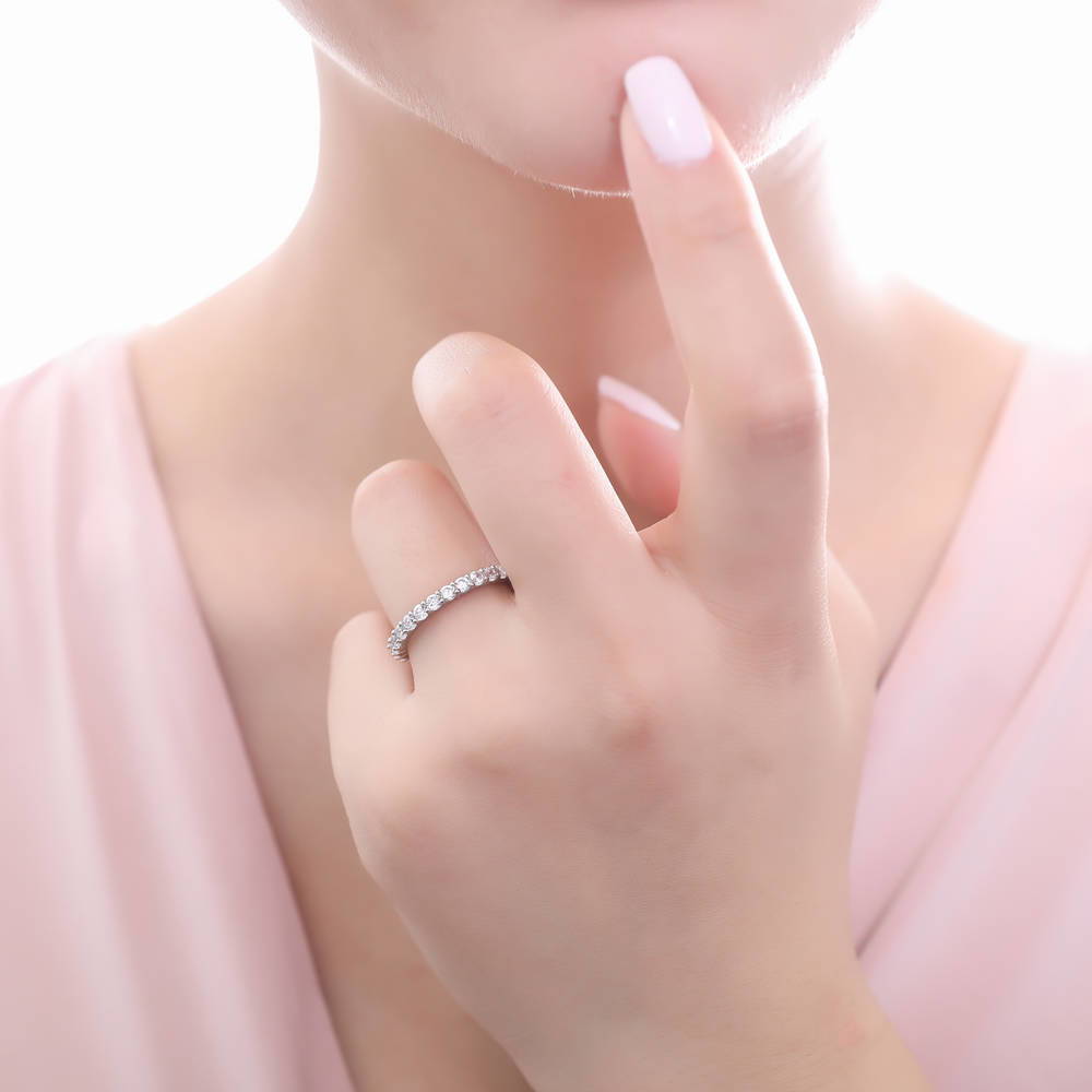 Model wearing Pave Set CZ Eternity Ring in Sterling Silver
