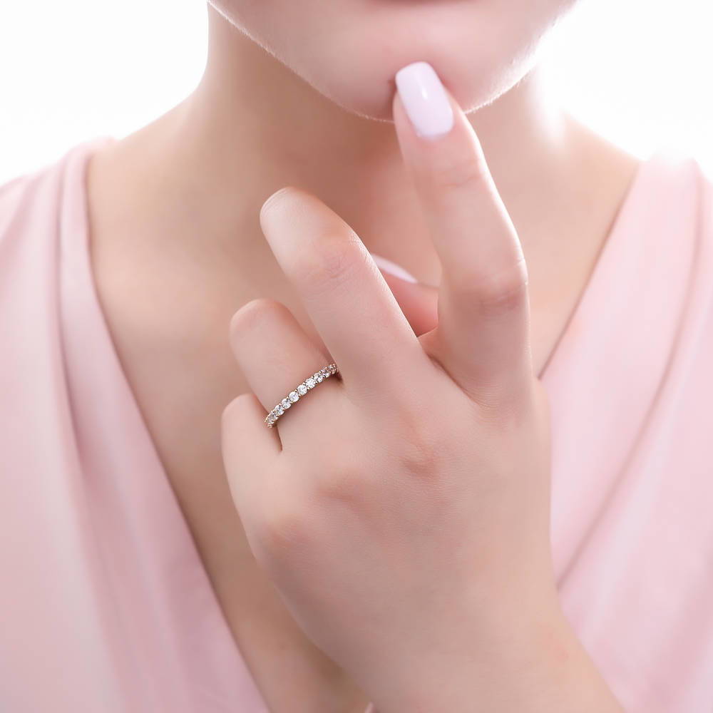 Model wearing Pave Set CZ Eternity Ring in Gold Flashed Sterling Silver