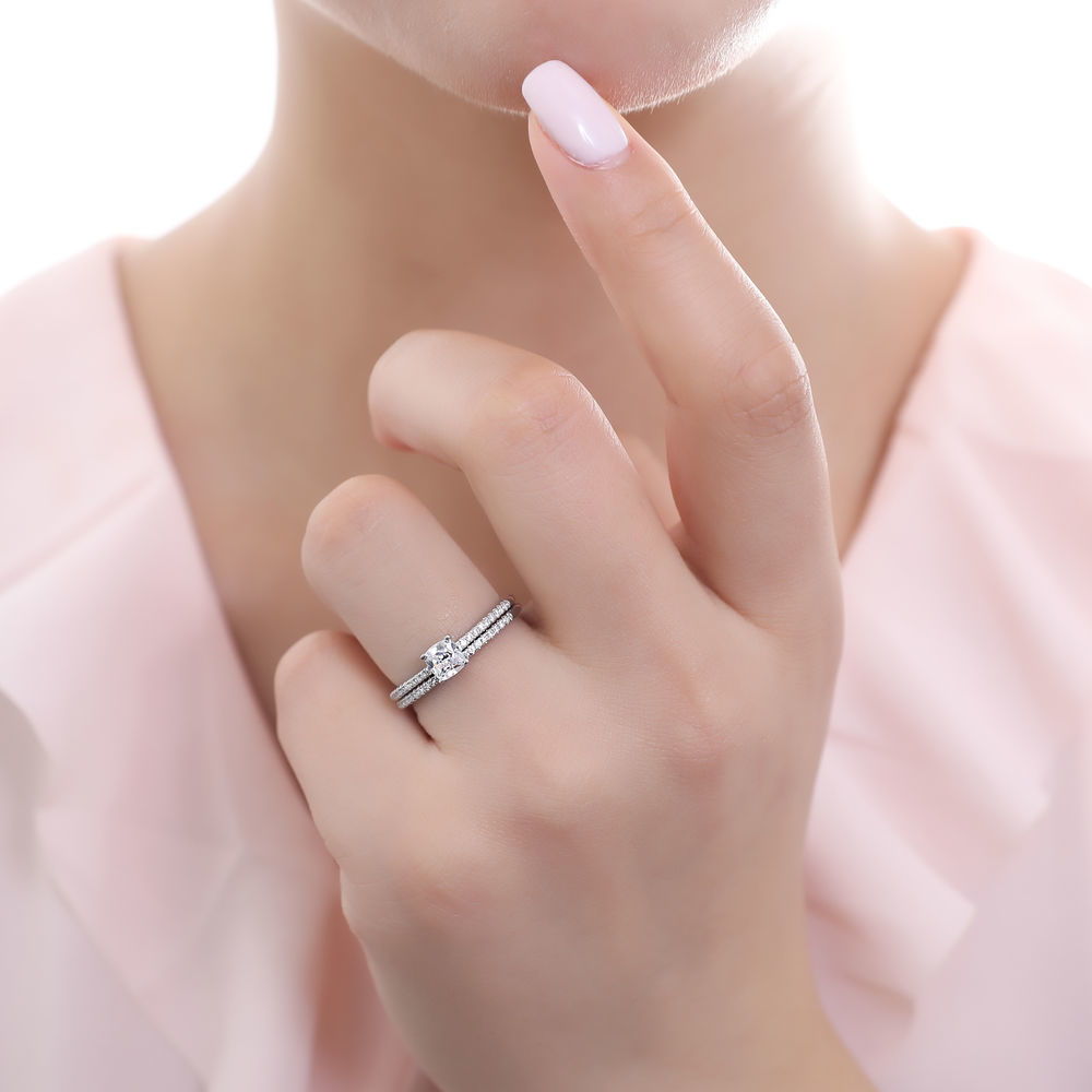 Model wearing Solitaire 0.6ct Cushion CZ Ring Set in Sterling Silver