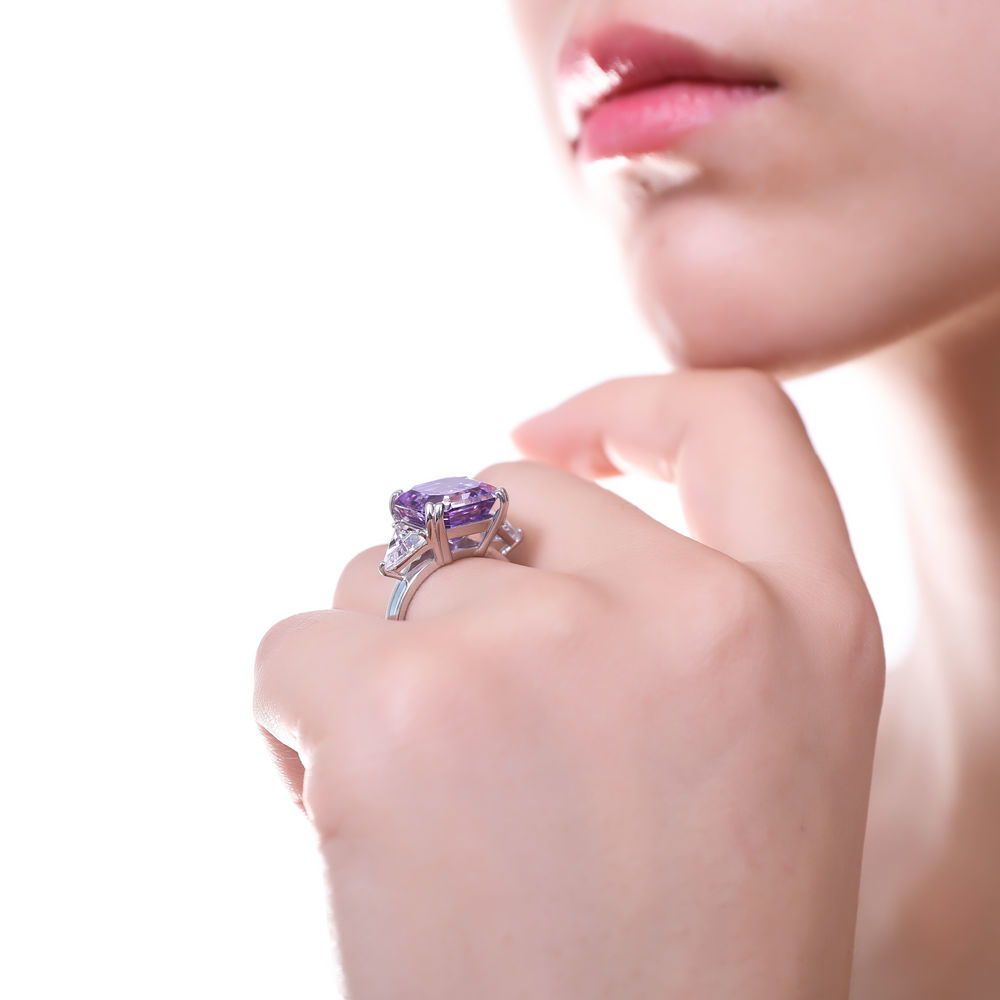Model wearing 3-Stone Purple Asscher CZ Statement Ring in Sterling Silver