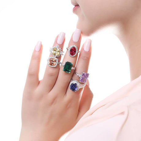 Image Contain: Model Wearing 3-Stone Ring, Halo Ring, Halo Split Shank Ring, Solitaire with Side Stones Ring
