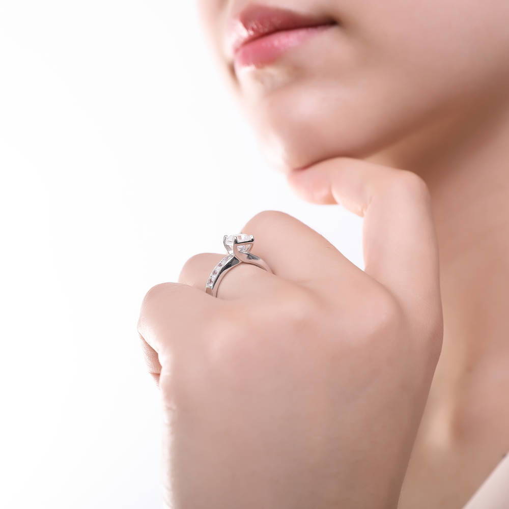 Model wearing Solitaire 1.6ct Asscher CZ Ring in Sterling Silver