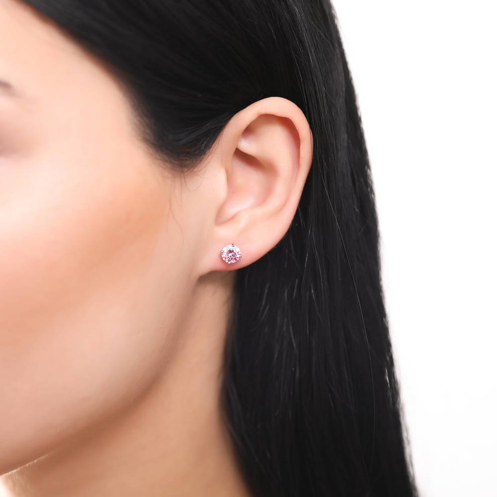 Model wearing Solitaire Round CZ Stud Earrings in Sterling Silver 1.6ct