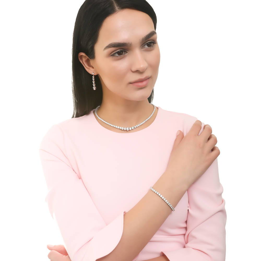 Model wearing Graduated CZ Statement Necklace and Earrings Set in Sterling Silver