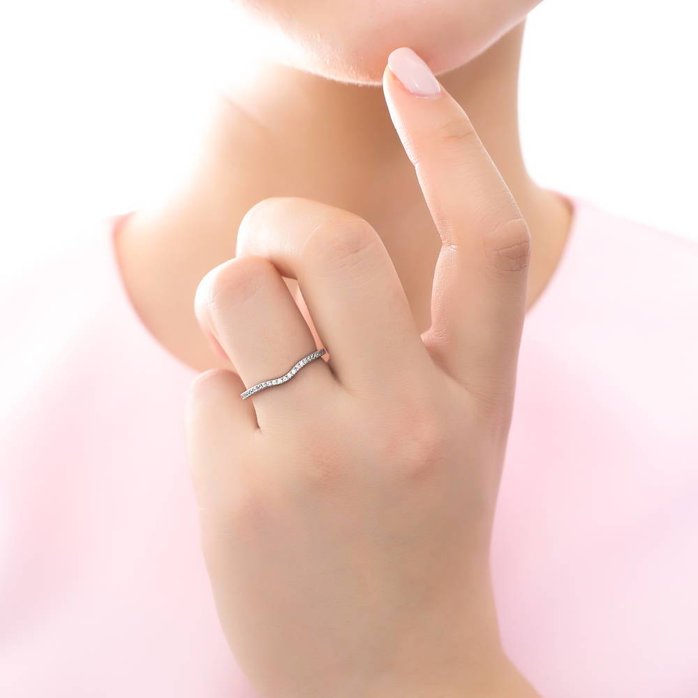 Model wearing Wishbone Micro Pave Set CZ Curved Half Eternity Ring in Sterling Silver, 2 of 8