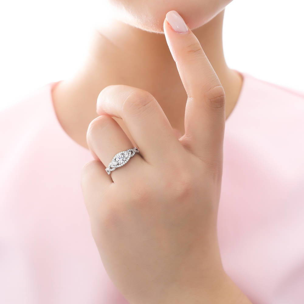 Model wearing 3-Stone Woven Round CZ Ring in Sterling Silver