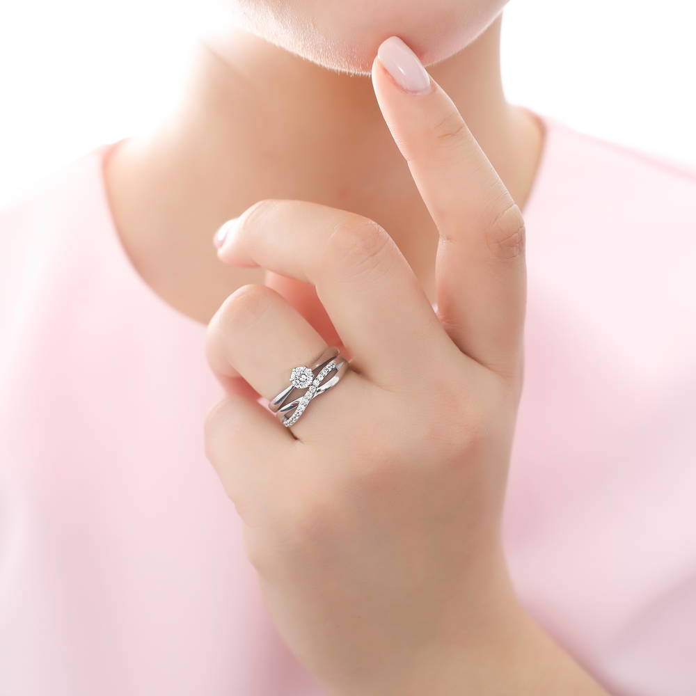 Model wearing Criss Cross Infinity CZ Ring Set in Sterling Silver